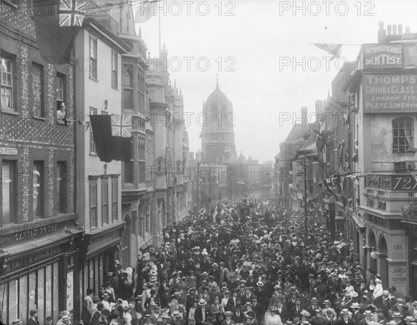 Crowds outside the Town Hall celebrating the coronation of King Edward VII, St Aldate's, Oxford,1902 Creator: Henry Taunt.