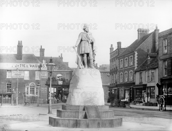 Marble statue depicting Alfred the Great, Market Place, Wantage, Oxfordshire, 1895.  Creator: Henry Taunt.