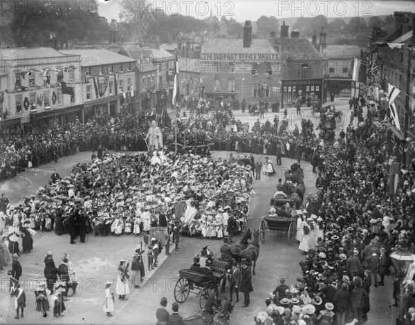 Large crowd in the Market Place to welcome Prince and Princess of Wales, Wantage, Oxfordshire,1898. Creator: Henry Taunt.