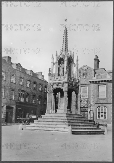 The Market Cross seen from the west, Market Square, Leighton Buzzard, Bedfordshire, 1910-1960. Creator: George R Long.
