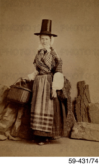 Studio photograph of a woman in Welsh costume, c1880s. Creator: Edwin P Lee.