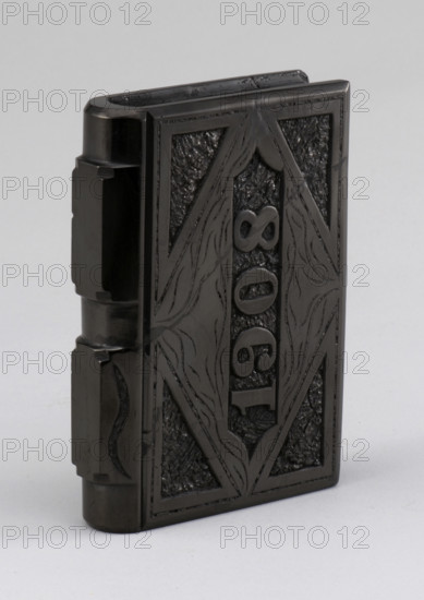 Coal carved in shape of a book, 1900s. Creator: F Jukes.