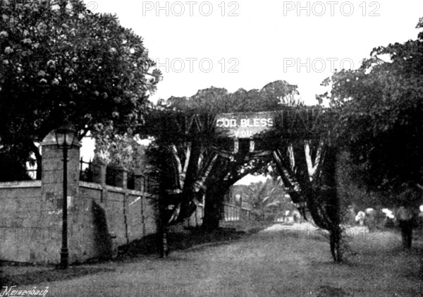 Arrival, and Subsequent Death, of Lady Carter at Lagos: triumphal arch opposite Christ Church, 1895. Creator: George Meisenbach.
