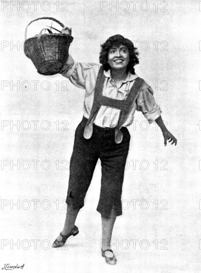Hänsel and Gretel,'' at the Gaiety Theatre: Miss Marie Elba as Hänsel, 1895. Creators: George Henry Hana, Hana Studios Ltd.	Hänsel and Gretel,'' at the Gaiety Theatre: Miss Marie Elba as Hänsel, 1895. London state production. '''Hurrah! My strawberry-basket is nearly brimful!"' From "Illustrated London News", 1895.
