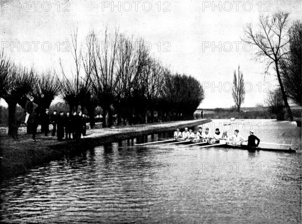 The Universities' Boat-Race: the Cambridge crew at practice - a word of advice from the coach, 1895. Creator: Stearn.