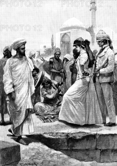 A Street Conjurer in Algiers, 1895. Creator: P Naumann.