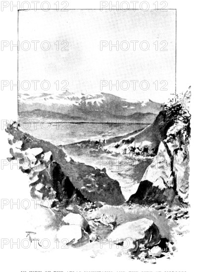 A Visit to Tafilet: in view of the Atlas Mountains and the city of Morocco, 1895. Creator: L. A. S..