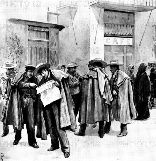 The Spanish-American Crisis: reading the latest news at a street corner in Seville, 1898. Creator: Unknown.