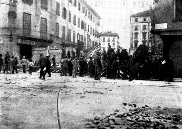 The Riots in Italy: street scenes in Milan - barricade at the corner of the Via Moscovia, 1898. Creator: Unknown.