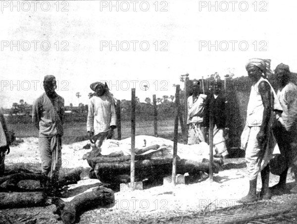 Scenes in Plague-Stricken Bombay: body lying on the pyre..., 1898. Creator: Gysi.