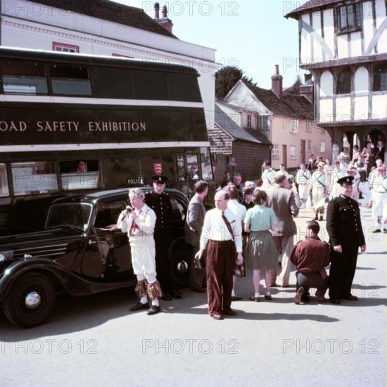 Morris dancers and policemen at a road safety exhibition, Essex, c1955.  Creator: Arthur Charles Kirby Ware.