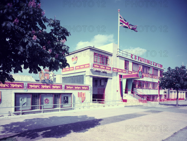 Premises of RB Pullin & Co Ltd decorated to celebrate the Coronation of Queen Elizabeth II, 1953. Creator: Arthur Charles Kirby Ware.