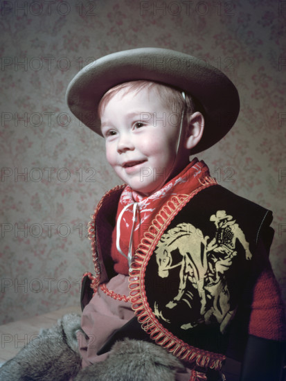 Young boy in a cowboy outfit, c1955.  Creator: Arthur Charles Kirby Ware.
