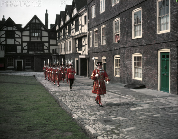 Yeomen Warders, Easter Sunday Parade led by the chief warder, Tower of London, 1954.   Creator: Arthur Charles Kirby Ware.
