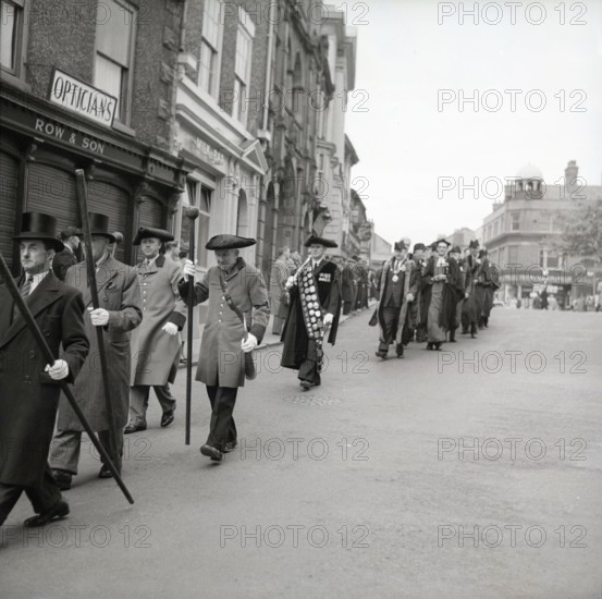 Horn blowers in procession, Ripon, Yorkshire, c1955.  Creator: Arthur Charles Kirby Ware.