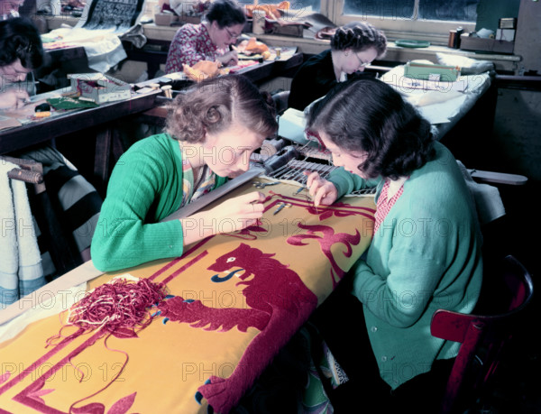 Embroidering the Royal Standard of Scotland used at the coronation of Queen Elizabeth II, 1953. Creator: Arthur Charles Kirby Ware.