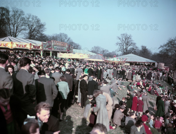 Scene at a busy funfair, c1955-1965. Creator: Arthur Charles Kirby Ware.