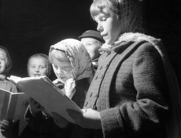 Carol singers, c1955. Creator: Arthur Charles Kirby Ware.