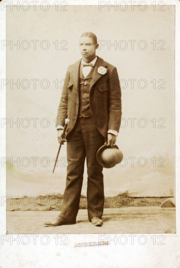 Full length portrait of man with bowler hat and cane, c1890-c1899. Creator: Anderson.