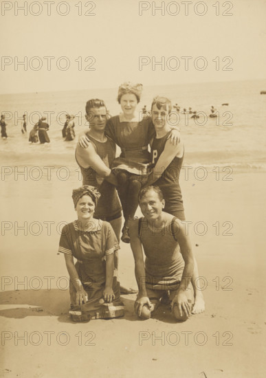 Group portrait on the beach, Block Island, 1912. Creator: Byram Woodhead.
