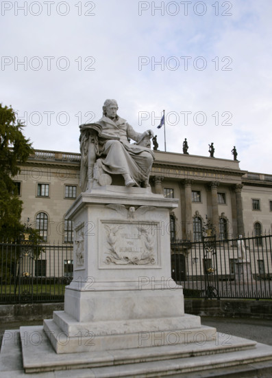 Marble statue of Wilhelm von Humboldt at the entrance to Humboldt University, Berlin, Germany, 2025. Creator: LTL.