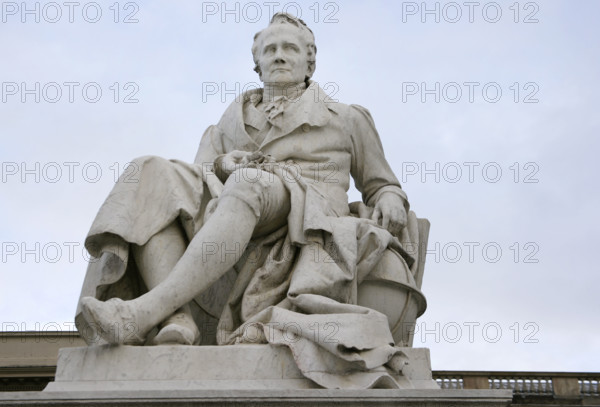 Marble statue of Alexander von Humboldt, entrance to Humboldt University, Berlin, Germany, 2025. Creators: LTL, Reinhold Begas.