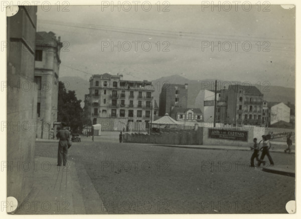 Street scene, Spain, early-mid 20th century. Creator: Edward Morland Lewis.