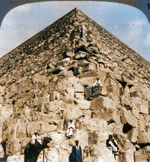 'Looking up the northeast corner of the Great Pyramid, Egypt', 1905. Creator: Underwood & Underwood.