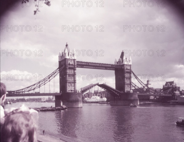 Tower Bridge with bascules raised, London, c1955. Creator: Arthur Charles Kirby Ware.