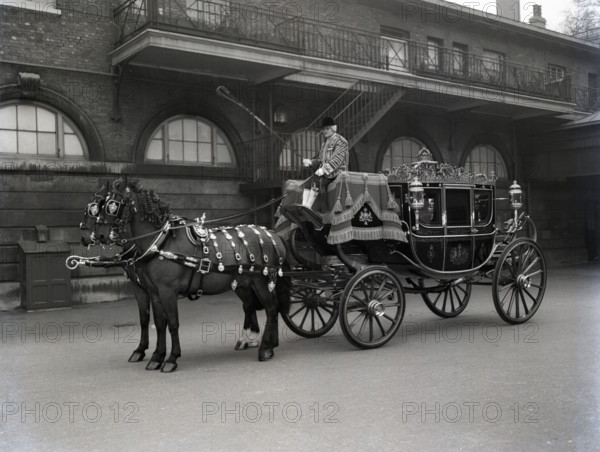 The Irish State Coach, Royal Mews London, 1953.  Creator: Arthur Charles Kirby Ware.