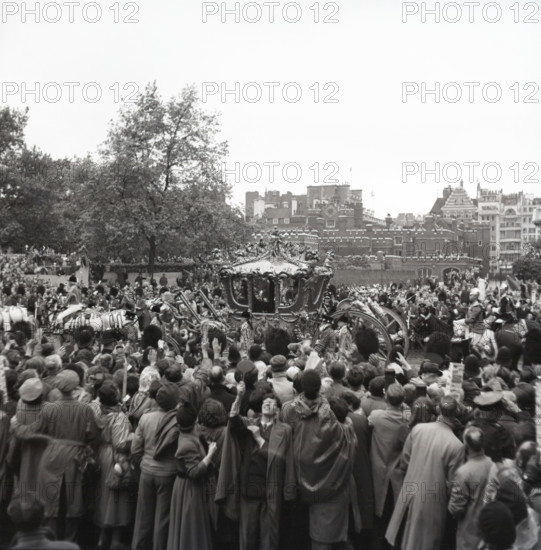Gold State Coach, Coronation of Queen Elizabeth II, London, 2 June 1953.  Creator: Arthur Charles Kirby Ware.