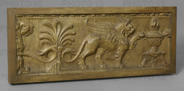 Cast of a fragment of a frieze depicting a Griffin and Candelabrum, late 18th cent-(early 19th cent? Creator: Unknown.