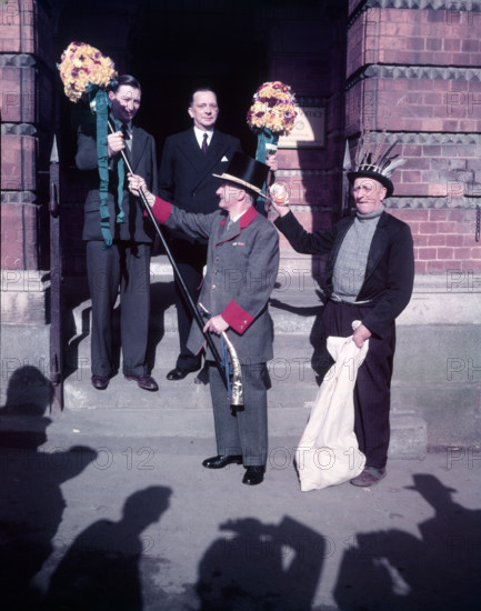 Tutti Men recieving Tutti Poles, Hocktide Festival, Hungerford, Berkshire, c1955. Creator: Arthur Charles Kirby Ware.