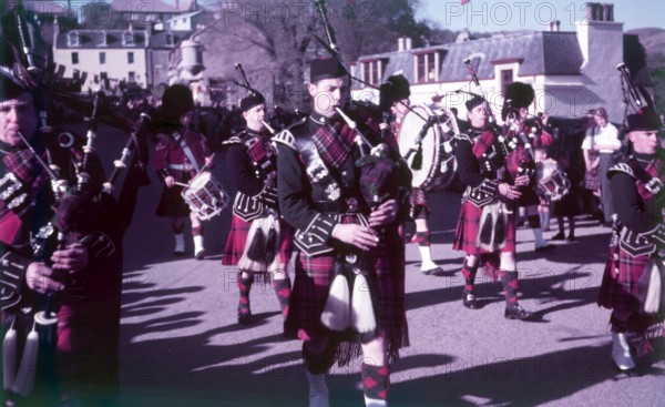 Pipers sounding 'The Retreat', Portree, Isle of Skye, Scotland, c1955.  Creator: Arthur Charles Kirby Ware.
