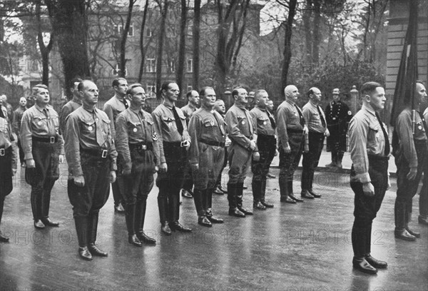 Hitler with SA troops, 1935