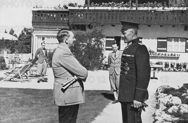 Hitler receiving the visit of a comrade in Obersalzberg, Bavaria, 1936