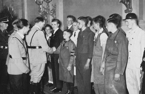 Hitler greeting young workers at the Chancellery (1934)