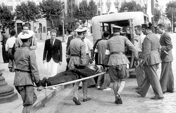 Injured man being evacuated, 1936