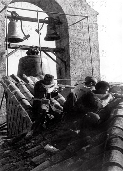 Republican militiamen on the roof of the Sigüenza church, 1936