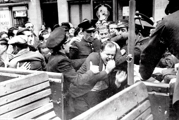 A sacristan is being lynched by the crowd, 1936