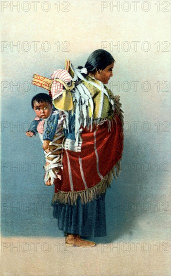 Carte postale représentant une femme Navajo avec son bébé au Nouveau Mexique