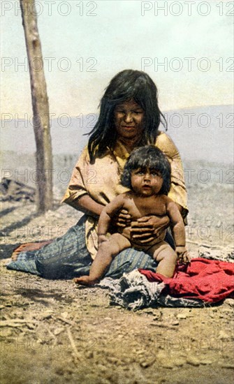 Postcard representing an Apache woman with her baby