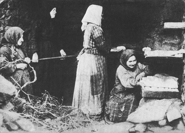 Bread baking, Corsica 1900.