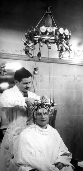 Hair curling in 1928.