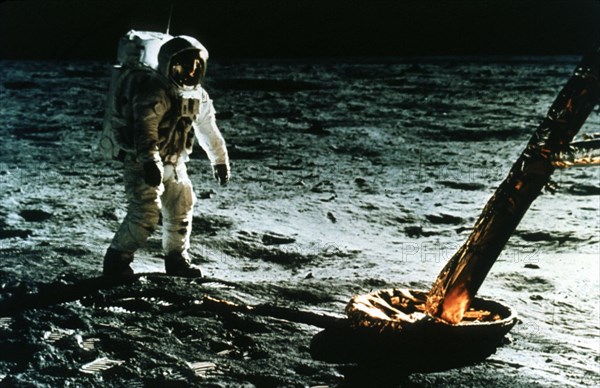 The Apollo 11 MNO 16 crew inspecting the LEM's foot pad