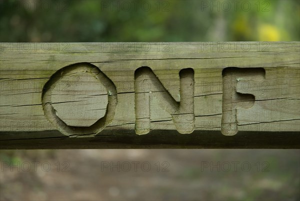 The National Forests Office logo on a barrier