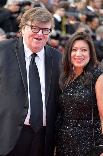 Michael Moore with his wife