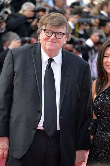 Michael Moore with his wife