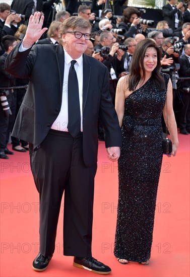 Michael Moore with his wife