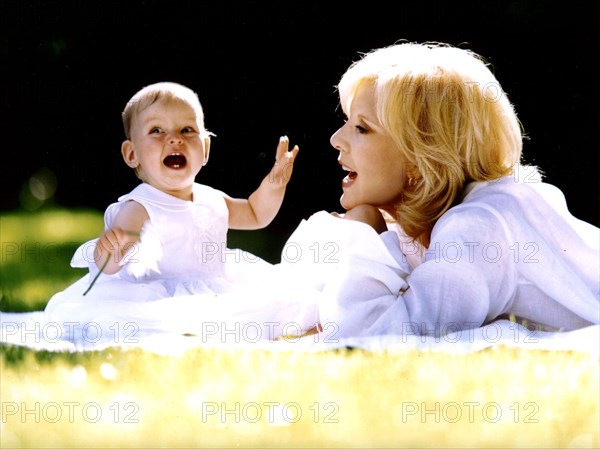 Sylvie Vartan and her adoptive daughter, Darina.